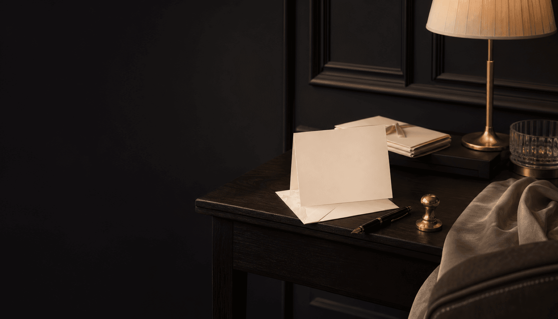 A matchmaker's writing desk in a dark room: cream envelopes, a fountain pen, and a wax seal in warm lamplight.